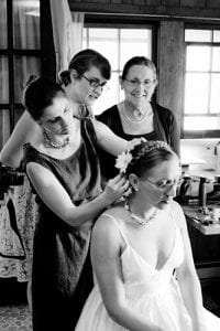 Wife and her bridesmaids getting ready for her wedding